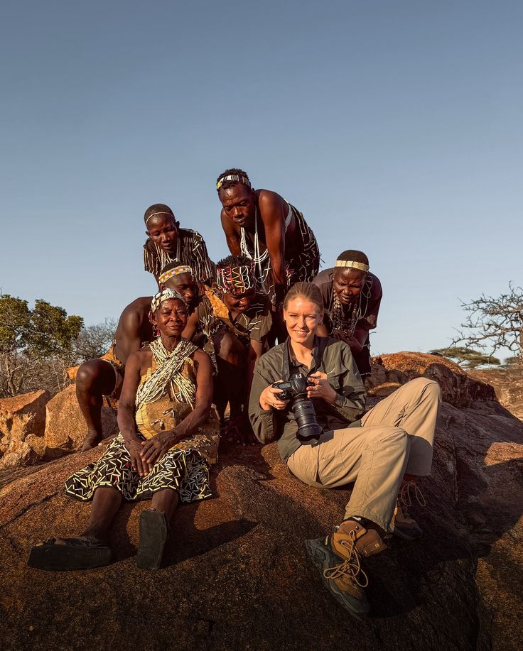 A visitor with Hadzabe community members